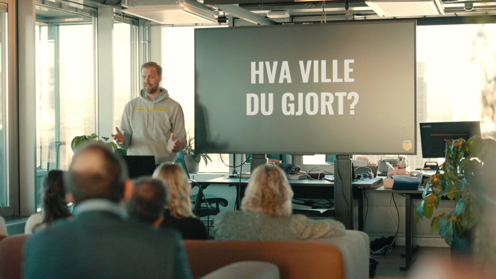 Secure Practice's co-founder Erlend Andreas Gjære on stage during a PrepJam cybersecurity exercise.